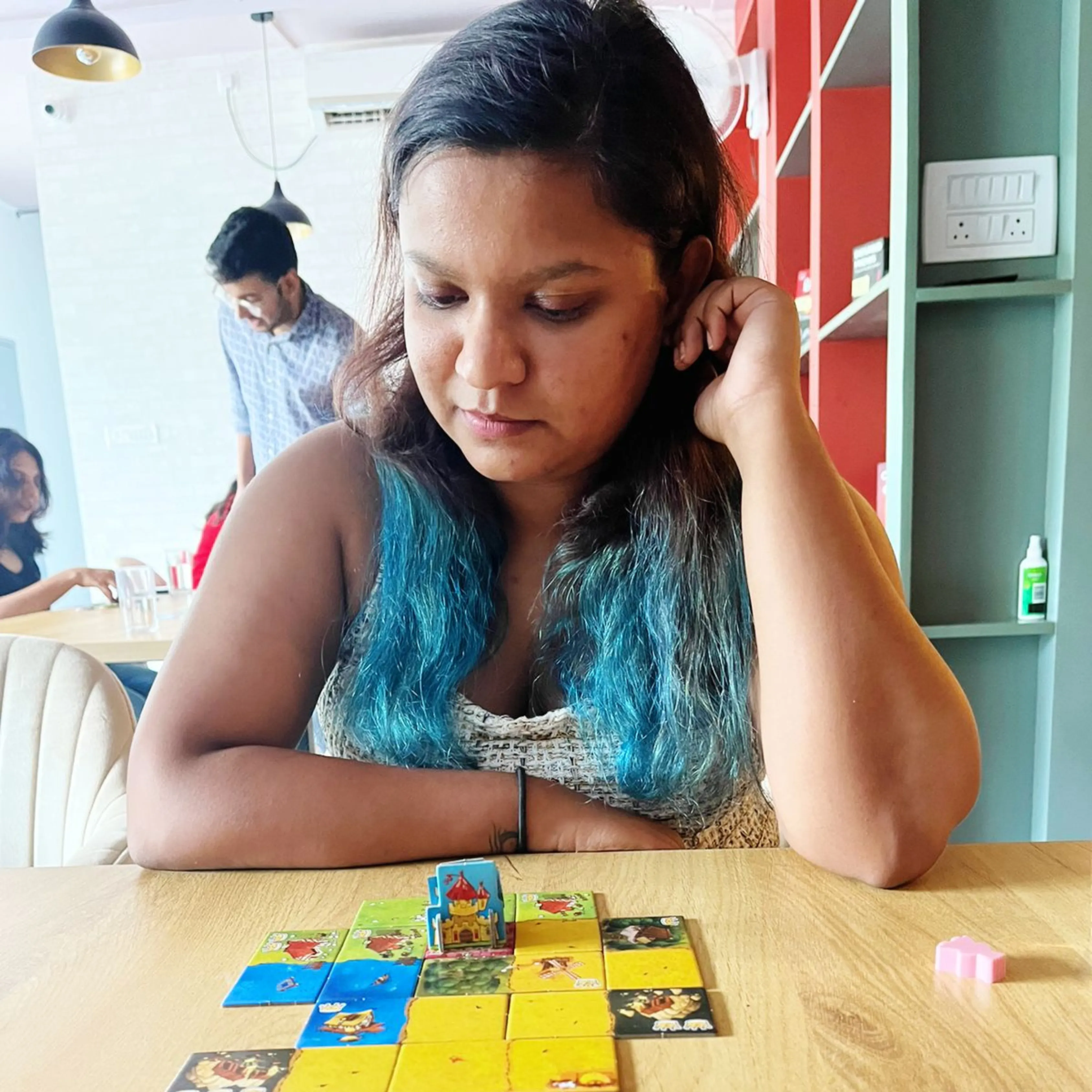 Players around a table at a Bangalore cafe